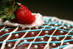 English: A chocolate cake decorated with icing...
